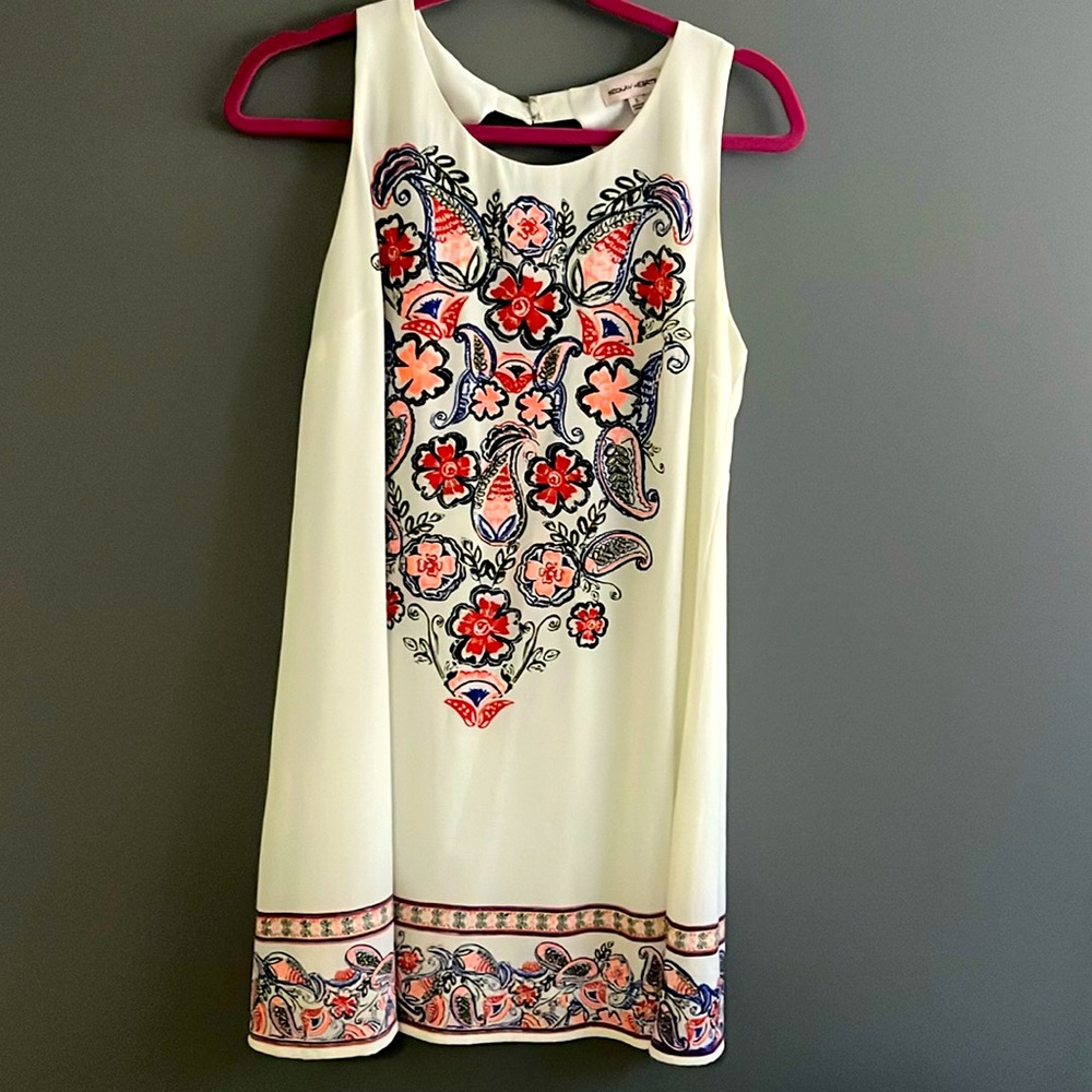 Fun and flirty, sleeveless shift dress
